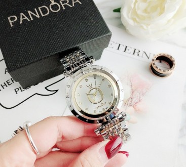
Стильные женские часы Pandora 
Характеристики:
Высококачественная известного бр. . фото 2