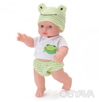 Милый игрушечный малыш выглядит, словно настоящий младенец. Пупс одет в шапочку . . фото 1