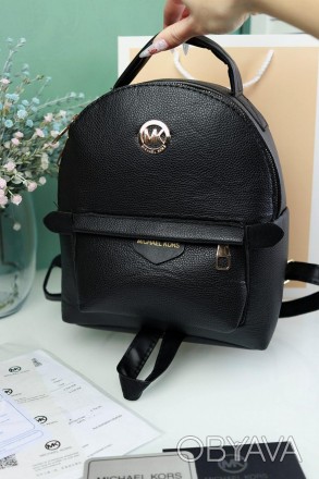 
Перед вами женский рюкзак Michael Kors брендовый рюкзак в черном цвете.
Одно от. . фото 1