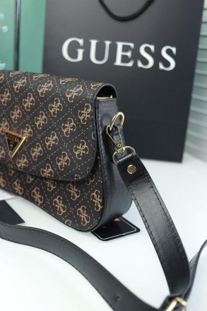 Женская сумка Guess ? Выполнена из качественной кожи, украшена фирменным логотип. . фото 5