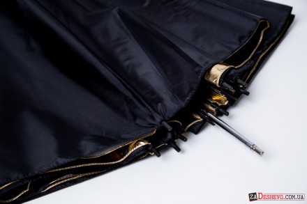 Студійна парасолька Mingxing 152 см чорний з золотим (48053)
Студійна парасолька. . фото 3