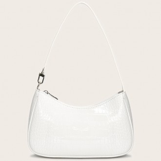  
Женская сумочка багет в стиле рептилии с фурнитурой серебряного цвета 
Парамет. . фото 3