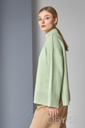 Жіночий светр Stimma Сінгел. Це стильний светр з розрізами по низу із круглою го. . фото 1