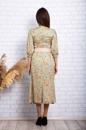 
Стильное платье производство Турция. Крой приталенный, длина миди, юбка расклеш. . фото 5