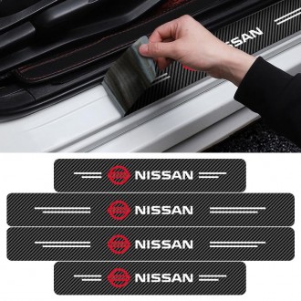 Захисна плівка на пороги з логотипом Nissan
Захисні накладки на пороги - найкращ. . фото 3