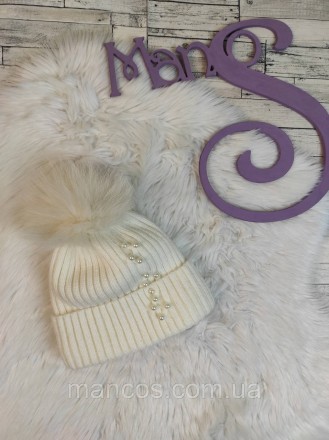Женская зимняя шапка Monleo с меховым помпоном молочного цвета с бусинами 
Состо. . фото 2