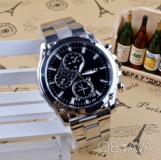 Мужские наручные часы V8 в стиле Armani
 Характеристики:
	
	Материал корпуса - м. . фото 1