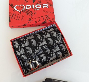 
Кошелек женский Dior. Кошелек Диор
Размер: 20*11см.
Цвет: Серый текстильный
Мат. . фото 2