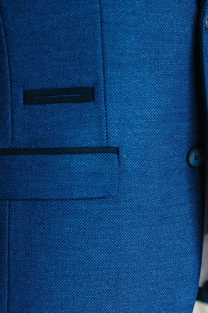 
ІНФОРМАЦІЯ ПРО ПРОДУКТ
Чоловічий вовняний синій класичний піджак напівприталени. . фото 5