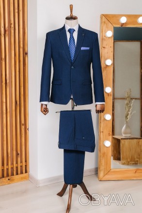 
ІНФОРМАЦІЯ ПРО ПРОДУКТ
Чоловічий темно синій класичний костюм піджак та штани
П. . фото 1