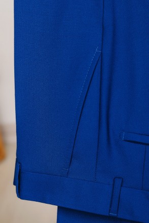 
ІНФОРМАЦІЯ ПРО ПРОДУКТ
Чоловічий яскраво синій класичний костюм піджак та штани. . фото 9