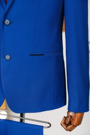 
ІНФОРМАЦІЯ ПРО ПРОДУКТ
Чоловічий яскраво синій класичний костюм піджак та штани. . фото 6
