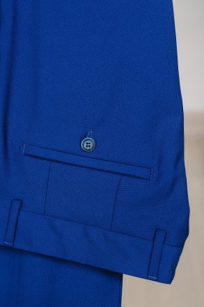 
ІНФОРМАЦІЯ ПРО ПРОДУКТ
Чоловічий яскраво синій класичний костюм піджак та штани. . фото 8