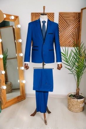 
ІНФОРМАЦІЯ ПРО ПРОДУКТ
Чоловічий синій класичний костюм піджак та штани
Піджак:. . фото 2