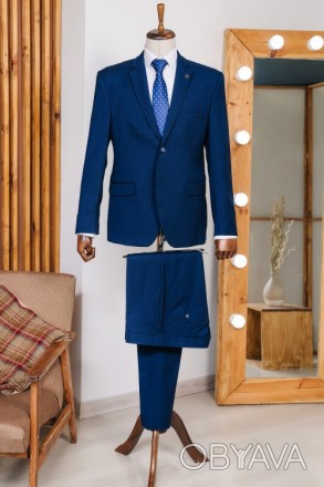 
ІНФОРМАЦІЯ ПРО ПРОДУКТ
Чоловічий синій класичний костюм піджак та штани
Піджак:. . фото 1