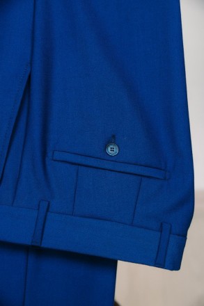 
ІНФОРМАЦІЯ ПРО ПРОДУКТ
Чоловічий синій класичний костюм піджак та штани
Піджак:. . фото 10