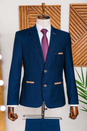 
ІНФОРМАЦІЯ ПРО ПРОДУКТ
Чоловічий синій класичний костюм піджак та штани
Піджак:. . фото 3
