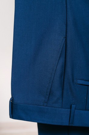 
ІНФОРМАЦІЯ ПРО ПРОДУКТ
Чоловічий синій класичний костюм піджак та штани
Піджак:. . фото 8
