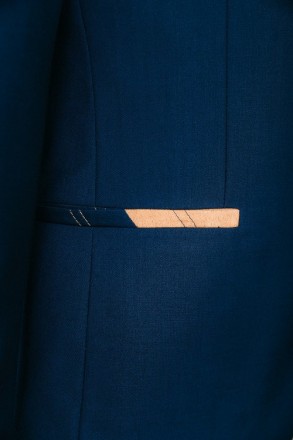 
ІНФОРМАЦІЯ ПРО ПРОДУКТ
Чоловічий синій класичний костюм піджак та штани
Піджак:. . фото 7
