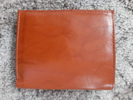 Кожаный коричневый кошелек Benzer (Индия)

Снаружи хорошая кожа
Внутри немнож. . фото 3