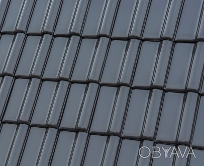 Крыша, изготовленная из керамической черепицы марки Röben, - это гарантия прочно. . фото 1