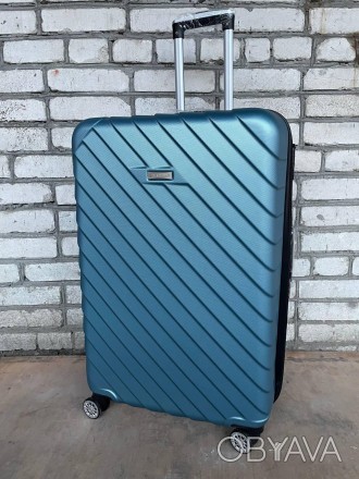 Валіза Madisson Corfou є ідеальним варіантом багажної валізи для поїздок або для. . фото 1