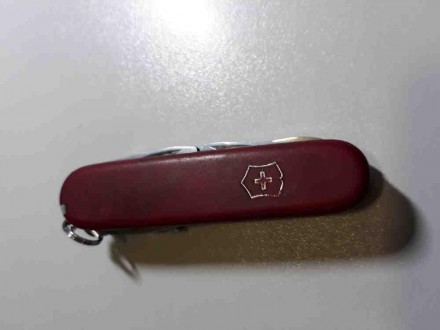 Складной многофункциональный нож от Victorinox. Красная пластиковая рукоять. Фун. . фото 2