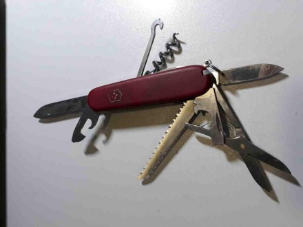 Складной многофункциональный нож от Victorinox. Красная пластиковая рукоять. Фун. . фото 4