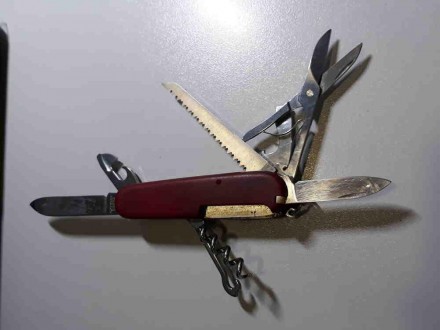 Складной многофункциональный нож от Victorinox. Красная пластиковая рукоять. Фун. . фото 5