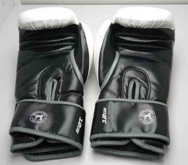Тип перчаток	тренировочные
Вид спорта	бокс
Вес	12 унций
Материал	искусственная к. . фото 3