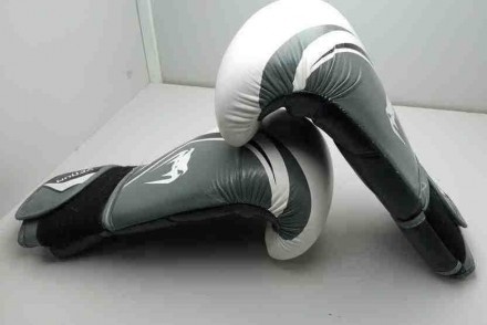 Тип перчаток	тренировочные
Вид спорта	бокс
Вес	12 унций
Материал	искусственная к. . фото 5