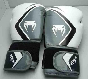 Тип перчаток	тренировочные
Вид спорта	бокс
Вес	12 унций
Материал	искусственная к. . фото 2