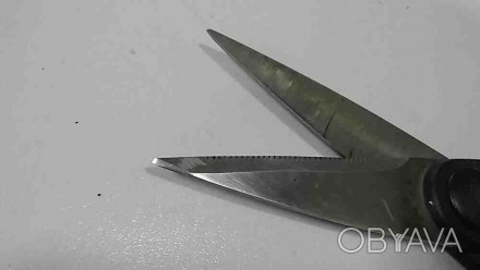 Ножиці універсальні поєднують у собі десять корисних дрібниць, так необхідних на. . фото 1
