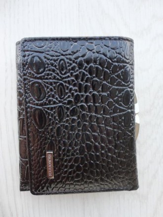 Женский кожаный кошелек Dr.Koffer (черный) 

Хорошее качество
Кожаный, с деко. . фото 3