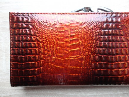 Большой женский кожаный кошелек dr.koffer (лакированный, оранжево-черный)

Отл. . фото 11