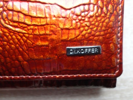 Большой женский кожаный кошелек dr.koffer (лакированный, оранжево-черный)

Отл. . фото 12