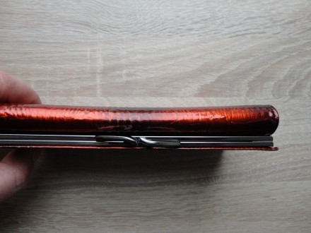 Большой женский кожаный кошелек dr.koffer (лакированный, оранжево-черный)

Отл. . фото 8