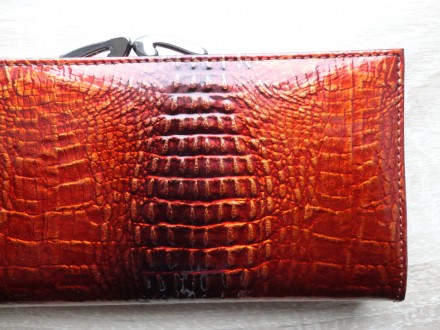 Большой женский кожаный кошелек dr.koffer (лакированный, оранжево-черный)

Отл. . фото 10