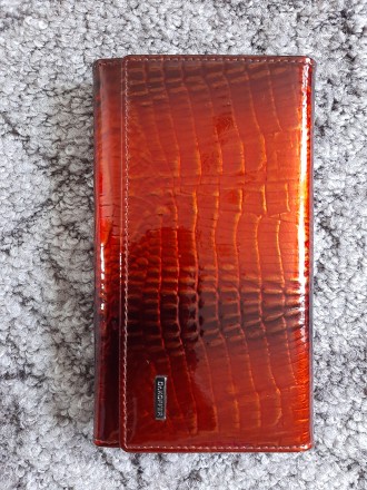 Женский кожаный кошелек Dr.Koffer (лакированный, оранжево-черный)

Отличное ка. . фото 2