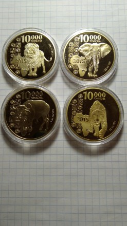 Набір монет Лев. Леопард. Слон. Буйвол. Замбія. 10000 квача. 2015. Монети нові. . . фото 2