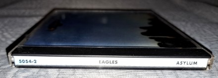 Продам СД Eagles - Eagles
Состояние диск/полиграфия VG+/VG+
Коробка Б.У. имеет. . фото 6
