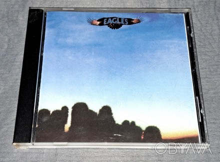 Продам СД Eagles - Eagles
Состояние диск/полиграфия VG+/VG+
Коробка Б.У. имеет. . фото 1