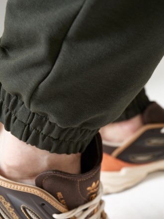Мужские спортивные брюки, низ брюк на резинке, выполнены из трикотажа двунить пе. . фото 9