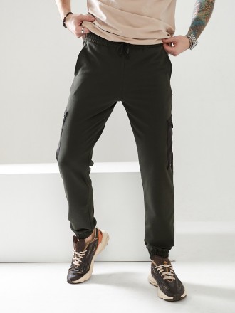 Мужские спортивные брюки, низ брюк на резинке, выполнены из трикотажа двунить пе. . фото 4