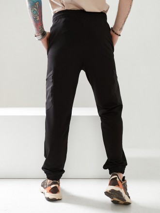 Мужские спортивные брюки, низ брюк на резинке, выполнены из трикотажа двунить пе. . фото 4
