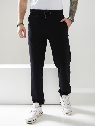 Мужские спортивные брюки, низ брюк на резинке, выполнены из трикотажа двунить пе. . фото 3