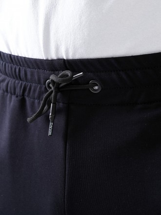 Мужские спортивные брюки, низ брюк на резинке, выполнены из трикотажа двунить пе. . фото 6