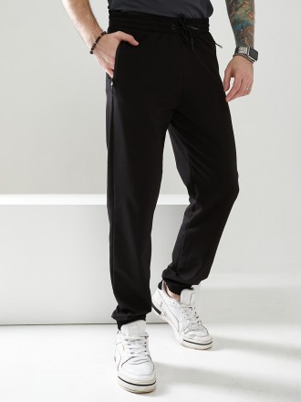 Мужские спортивные брюки, низ брюк на резинке, выполнены из трикотажа двунить пе. . фото 7