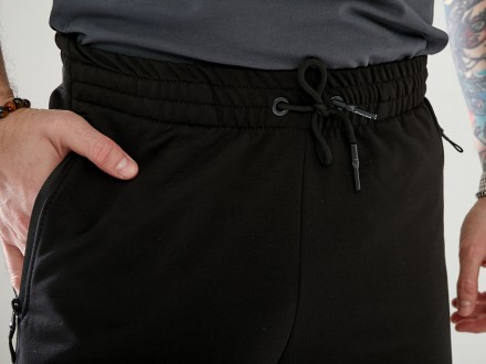 Мужские спортивные брюки, низ брюк на резинке, выполнены из трикотажа двунить пе. . фото 8