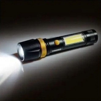 Професійний акумуляторний ліхтар, що випромінює сильний і яскравий промінь світл. . фото 2